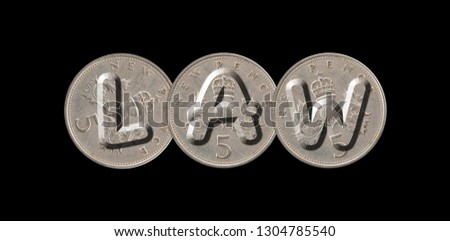 LAW – Coins on black background