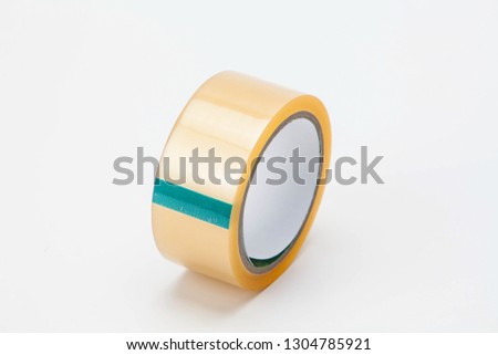 Roll of adhesive tape isolated on white background