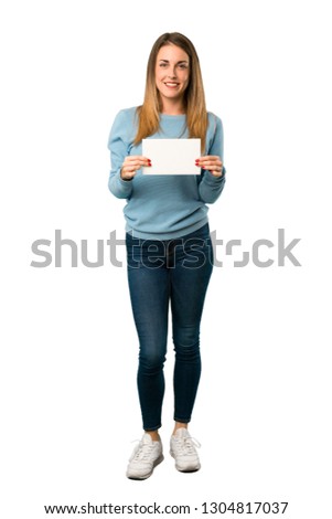Full body of Blonde woman with blue shirt holding a placard for insert a concept on white background