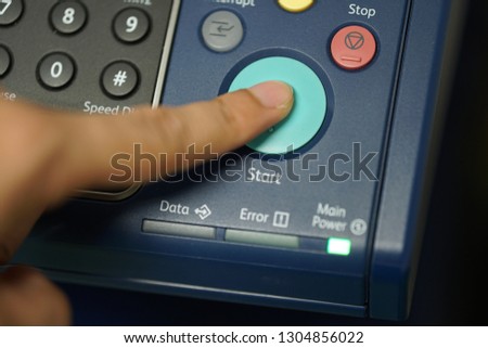 Finger start button. Concept of new year. - Image Royalty-Free Stock Photo #1304856022