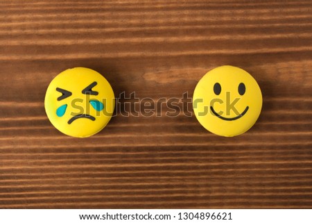 Funny smiley face on wooden background. Positive mood. Empty text space