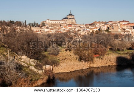 Traditional buildings and the river Tagus (río Tajo), the old town of Toledo, the former capital of Spain in Castile–La Mancha region, Europe. 