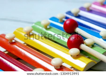 Close up view and selective focus of colorful rainbow xylophone.