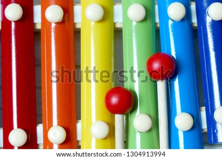 Close up view and selective focus of colorful rainbow xylophone.