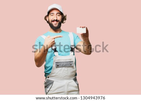profesional painter  holding a visit card