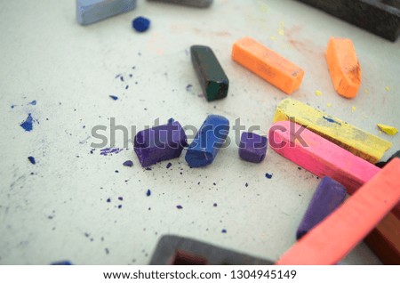 Nice pieces of crayons close-up. Bright and colorful art material. School tools for education. Creative background.