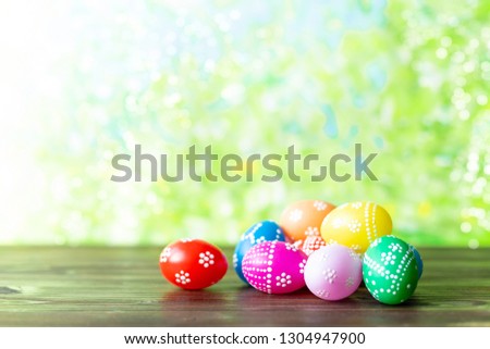 bright early colored easter eggs on a sunny spring background Copy space