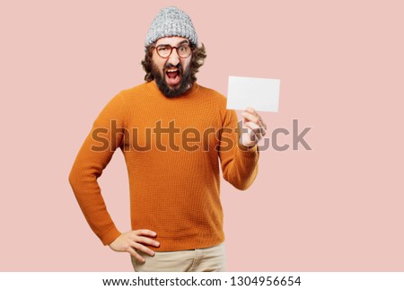 young bearded man with a placard