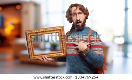 young hippie man with a baroque frame