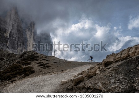 Biker on the Dolomiti mountains