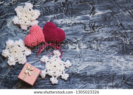 knitted hearts on a blue background