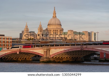 Blackfriars bridge in London with St Paul's Cathedral in the background