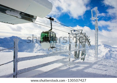 Ski lift in the winter mountains