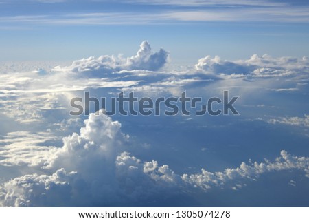 blue sky with cloud over sea from airplane view