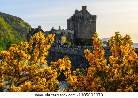 Scotland, Europe travel destination. Isle of Skye. Scenic landscape view of Eilean Donan Castle while sunset. Castles Of Scotland, Highlands. Tourist popular attraction/destination