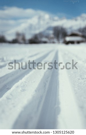 Cross-country skiing slope in Austria, beautiful mountain scenery, blurry background