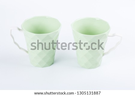 
two mugs on white background
