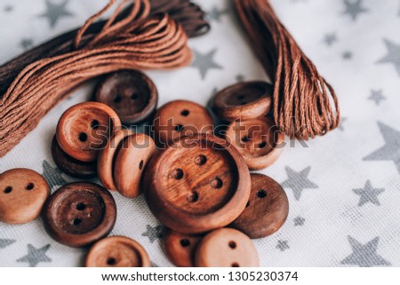 wooden buttons handmade in beautiful cotton fabrics in grey stars