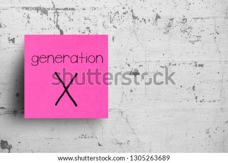 Sticky note on concrete wall, Generation X Royalty-Free Stock Photo #1305263689