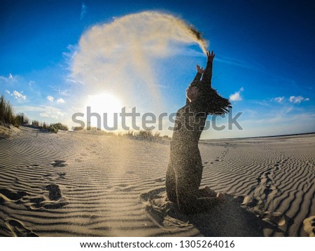 Throwing sand into the sun