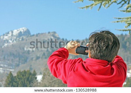 boy  that he photographed the Summit of a mountain in winter