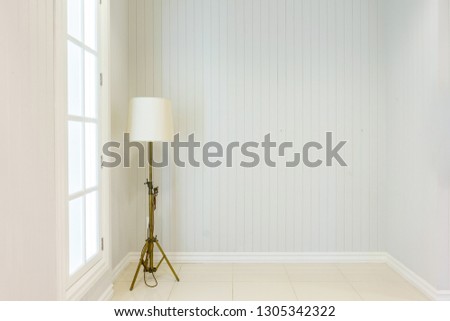 Modern floor Lamp in upscale luxury Home with white walls. Scandinavian interior design