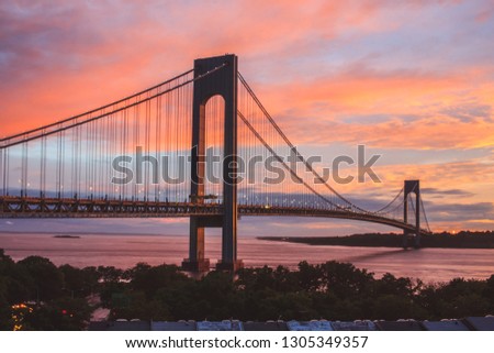 Verrazzano-Narrows bridge in Brooklyn and Staten Island, NYC at sunset with colorful sky