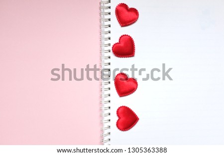  notebook  with red heart shape , valentine  holiday concept