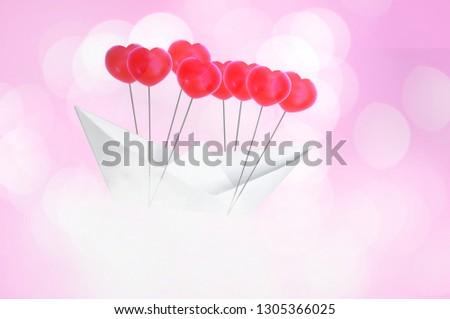 Paper boat with red heart shape balloon  flying on Blue sky and clouds. Concept Valentine's day , Sweet dream