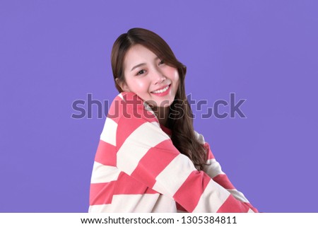 Asian woman bashful and shy for dating , long sleeves t-shirt, purple background