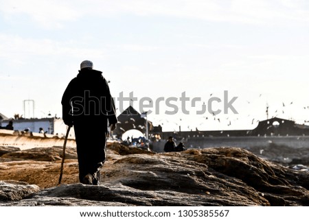 fisherman on beach, photo as background