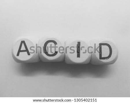 word acid spelled on dice
