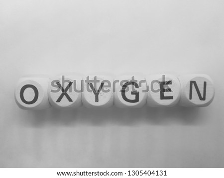 word oxygen spelled on dice