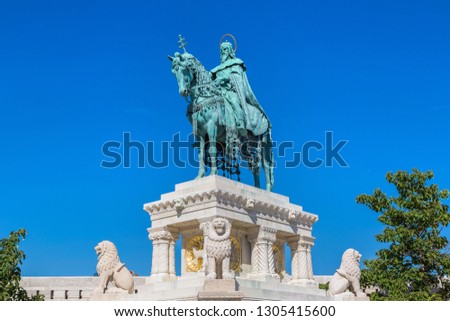 Horse riding statue of Stephen I the first king of Hungary in front of Fisherman's bastion in Budapest in Hungary in a beautiful summer day