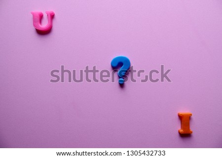 'u ? i' what do you think about me, word Close-up shot selective focus colorful, magnetic letters with romantic question for Valentine's Day