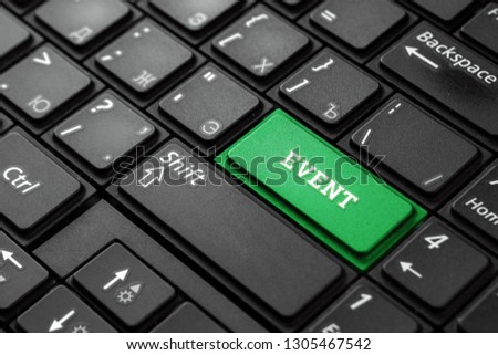 Close up green button with the word Event, on a black keyboard. Creative background, copy space. Concept for magic button, event, speakers, information.