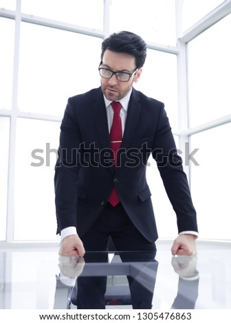 serious businessman holds a working meeting