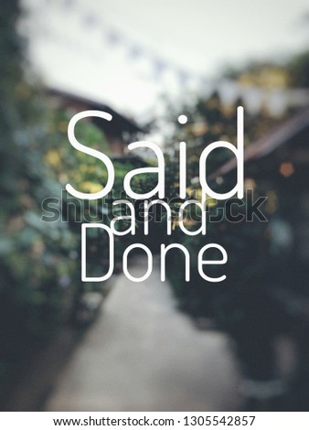 Said and done typography with soft blurry green garden background.