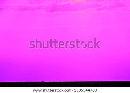 scenery seascape on blurred vision when sun setting on cloudy sky over sea horizon before sunset in silhouette and minimal style so impressive outdoor pattern for awesome nature background