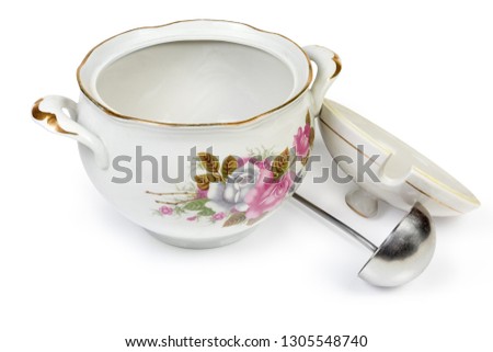 Empty vintage ceramic white painted tureen with open lid, stainless steel ladle on a white background
 Royalty-Free Stock Photo #1305548740
