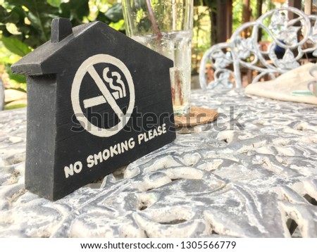 No smoking sign in this house Placed in the cafe.