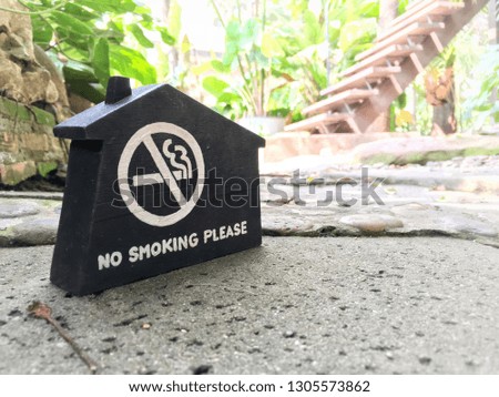 No smoking sign in this house Placed in the cafe.