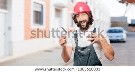 young man worker with a credit card