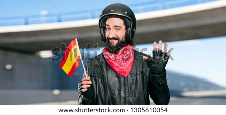 motorbike rider with a spain flag