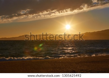 Beautiful sunset light over the mediterranean ocean near the small Spanish town Palamos, in Costa Brava
