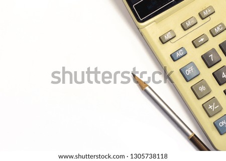 Pencil and calculator with copy space ,Top view