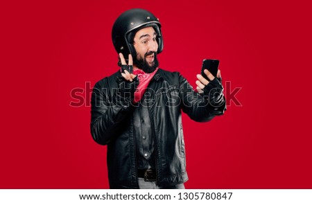 motorbike rider with a smart phone