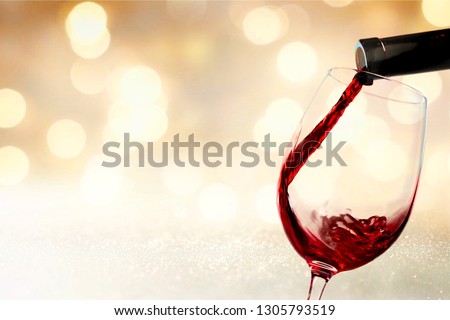 Red wine glass  on  background