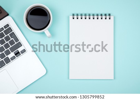 Blank writing pad for ideas and inspiration on colored background
