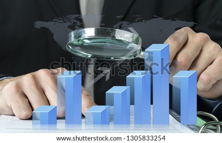 Human hands holding magnifying glass on background